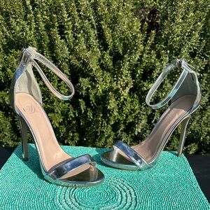 D Brand-silver metallic stiletto sandals-size 6-used 3 times-in good condition.